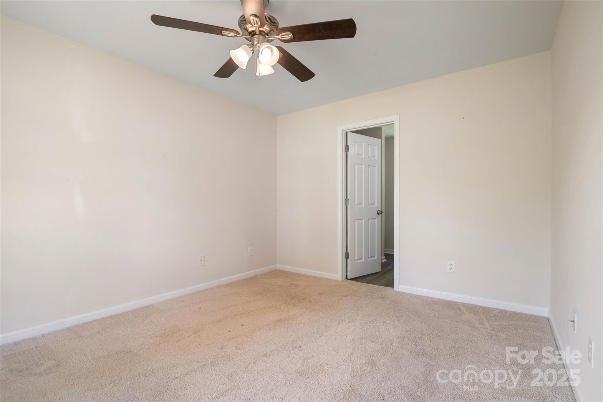 1620 Tate Road Rock Hill, SC 29732 - Photo 12 of 33 an empty room with a window and a fan