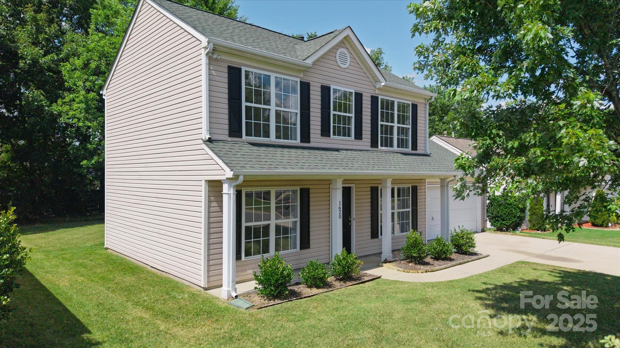 1620 Tate Road Rock Hill, SC 29732 - Photo 2 of 33 a front view of a house with a yard and potted plants