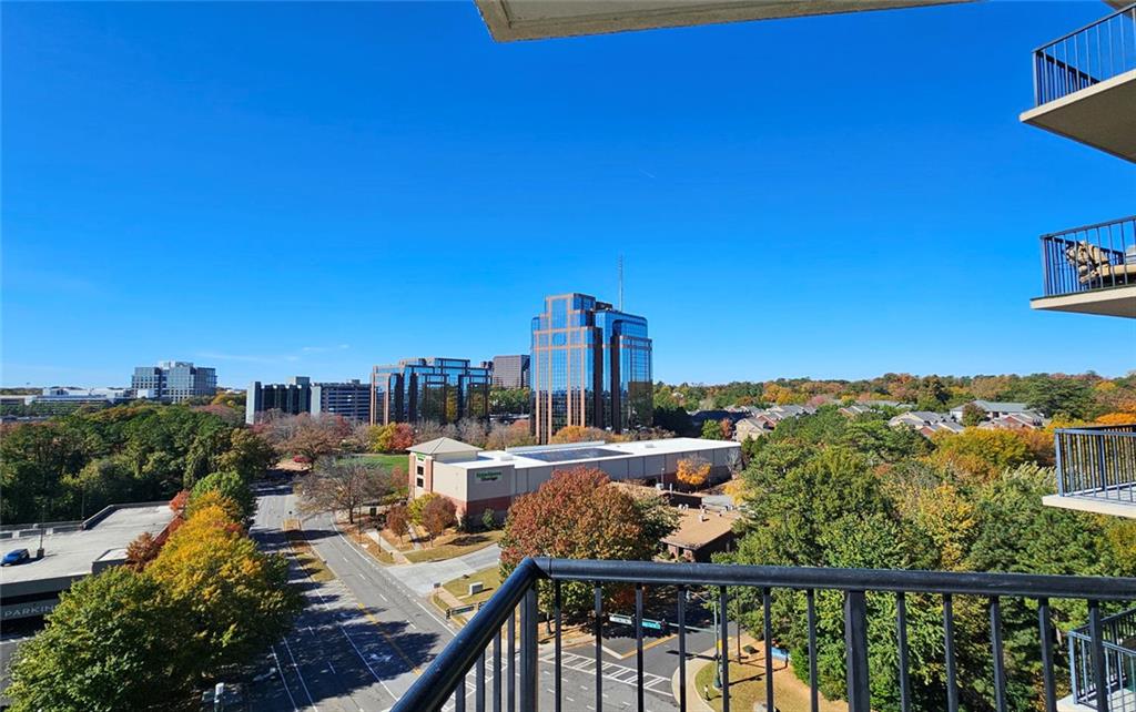4561 Olde Perimeter Way, Unit 1202 Atlanta, GA 30346 - Photo 21 of 46 a view of a city from a balcony