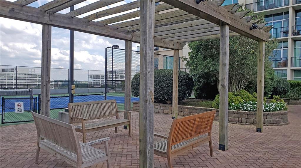 4561 Olde Perimeter Way, Unit 1202 Atlanta, GA 30346 - Photo 45 of 46 a view of outdoor space with seating