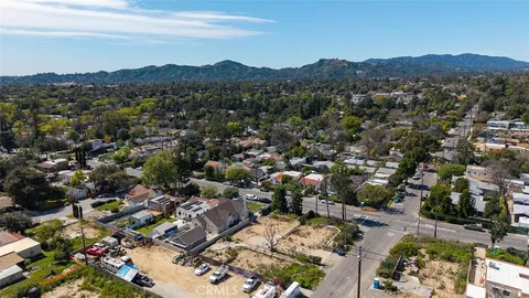 an aerial view of residential house with outdoor space