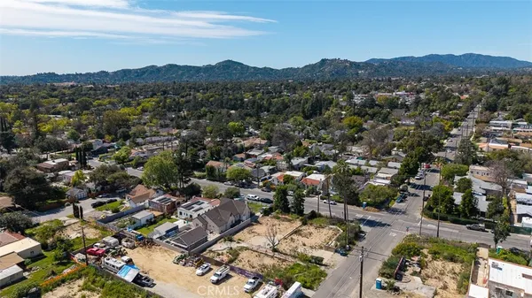 an aerial view of residential house with outdoor space