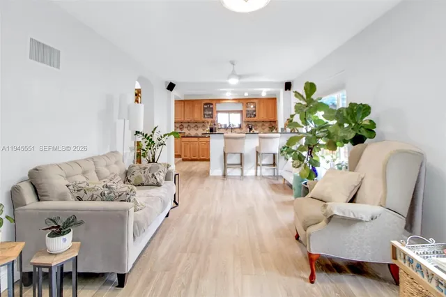 a living room with furniture and a couch