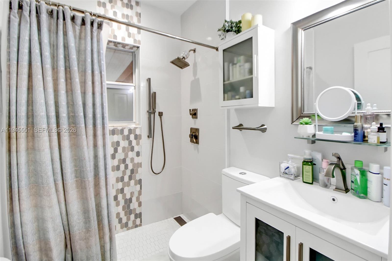 6250 Southwest 19th Street Miami, FL 33155 - Photo 21 of 35 a bathroom with a sink toilet and shower