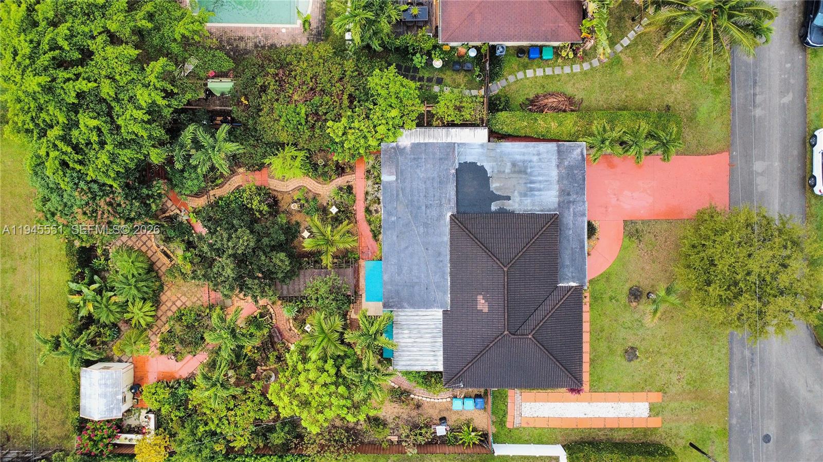 6250 Southwest 19th Street Miami, FL 33155 - Photo 33 of 35 an aerial view of a house with yard and swimming pool