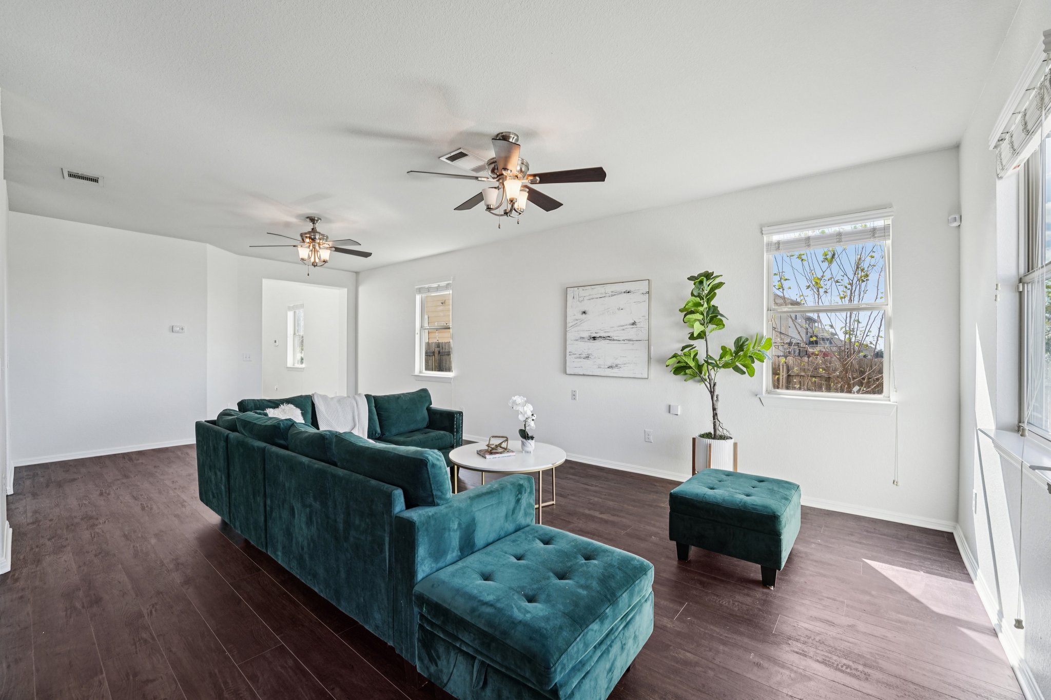 288 Triumph Road Buda, TX 78610 - Photo 5 of 19 a living room with furniture and a wooden floor