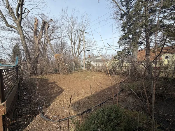 a view of yard covered with snow