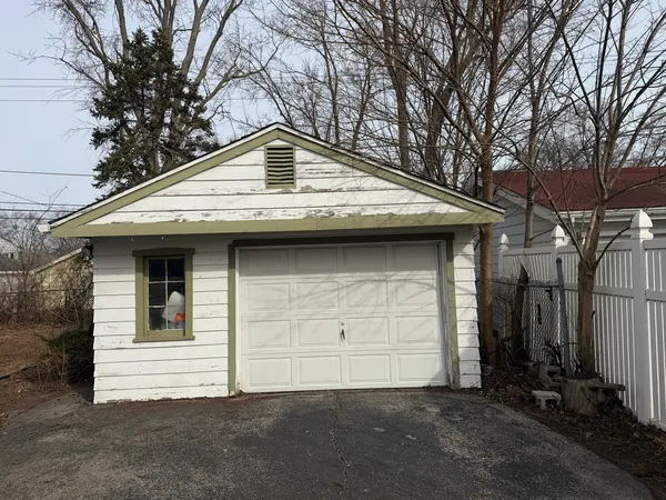 a view of a house with a garage