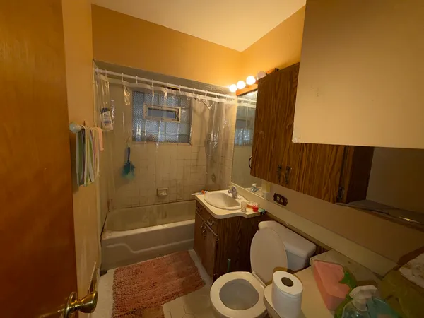 a bathroom with a sink and a shower