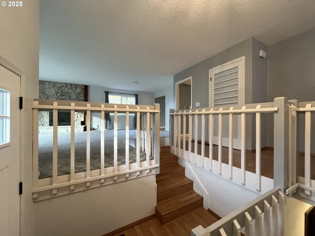 a view of a balcony with staircase