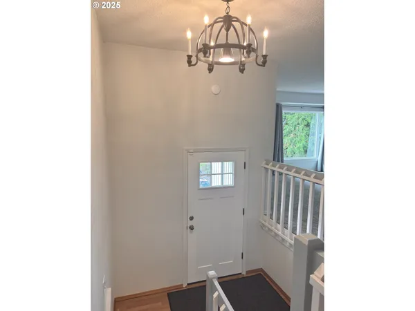 a view of a hallway with windows