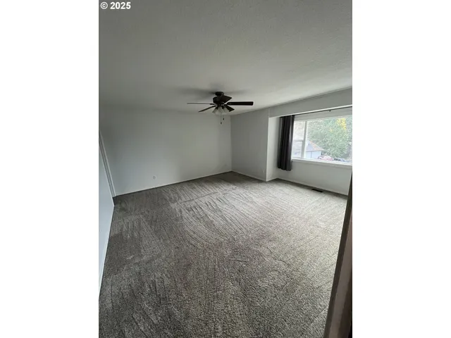 a view of a room with a window