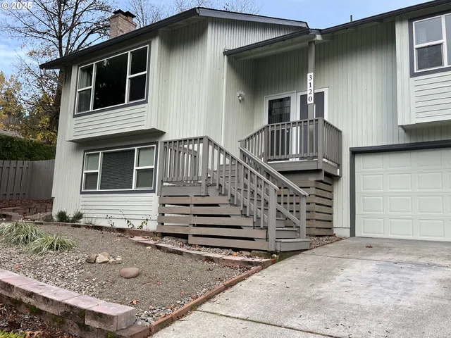 a front view of house with street