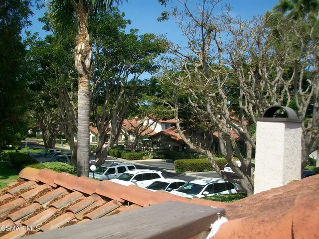 a view of a backyard of the house