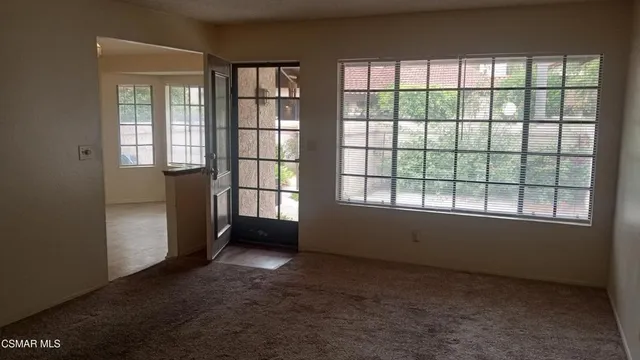 an empty room with windows
