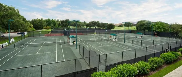 a terrace with outdoor seating and city view