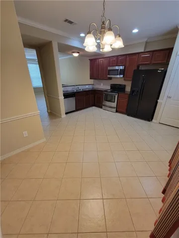a view of a kitchen with granite countertop breakfast area