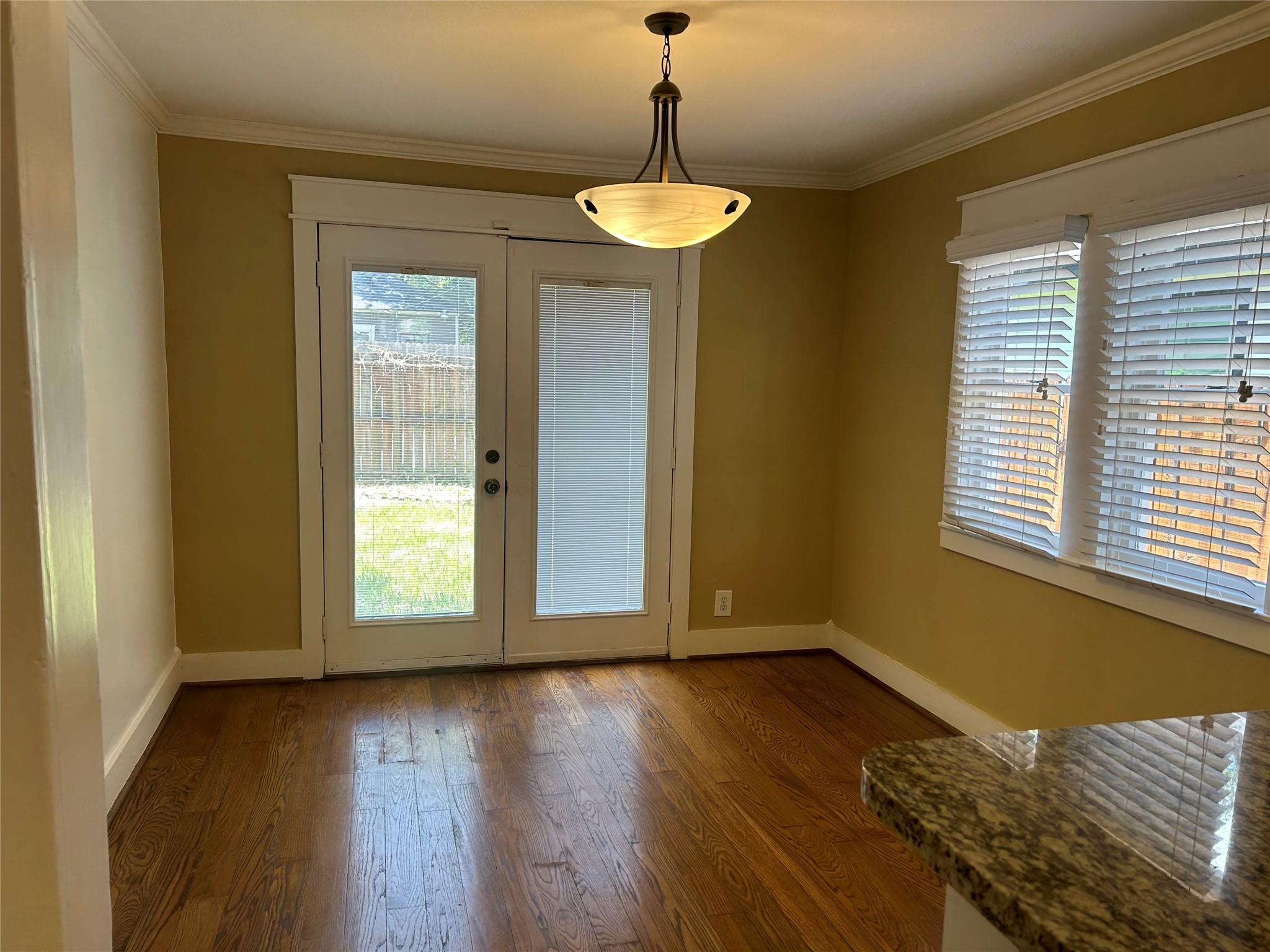 209 Walton Street Houston, TX 77009 - Photo 12 of 24 a view of a room with wooden floor and entryway