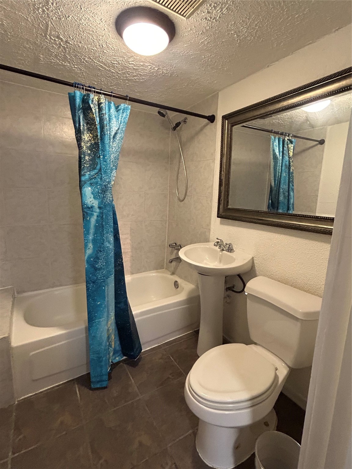 209 Walton Street Houston, TX 77009 - Photo 22 of 24 a bathroom with a sink toilet and shower