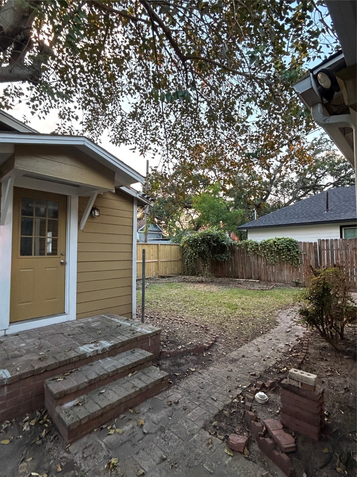 209 Walton Street Houston, TX 77009 - Photo 23 of 24 a view of a house with a yard