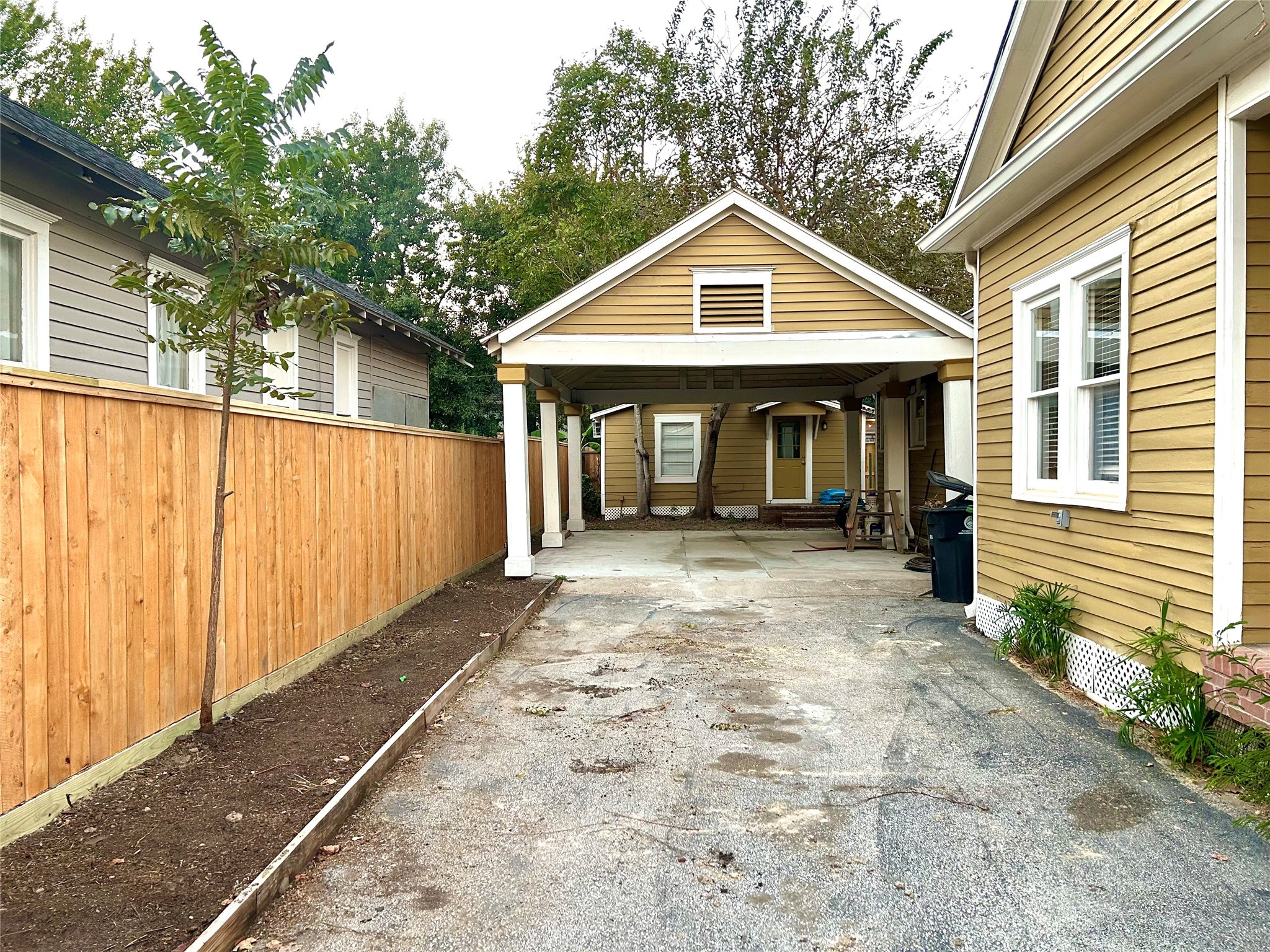 209 Walton Street Houston, TX 77009 - Photo 3 of 24 a front view of a house with a yard