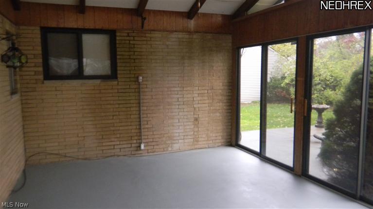 24419 Ronan Road Bedford Heights, OH 44146 - Photo 20 of 25 Enclosed 4 seasons room that leads to the out door patio