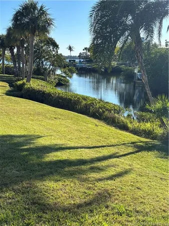 a view of a lake from a yard