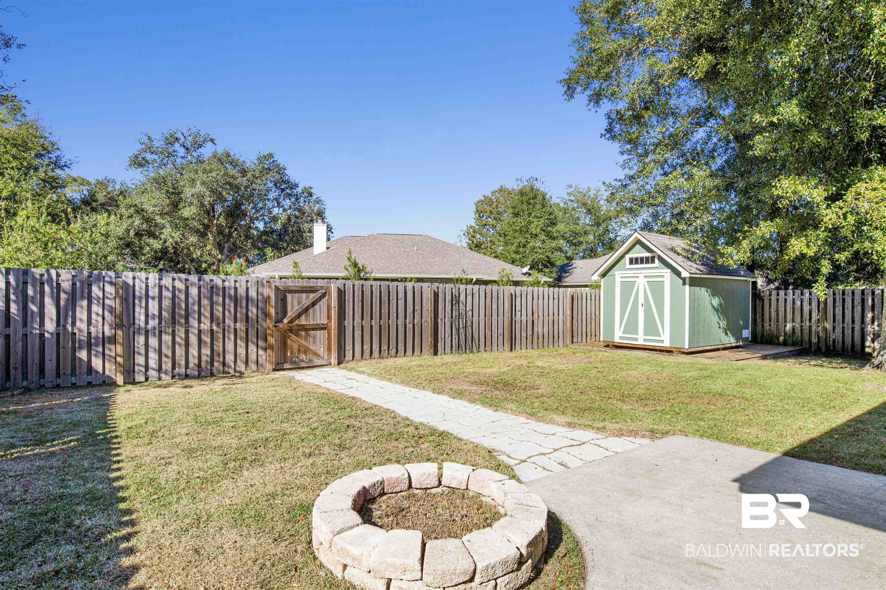 7145 Raintree Lane Gulf Shores, AL 36542 - Photo 21 of 25 View of yard featuring a shed