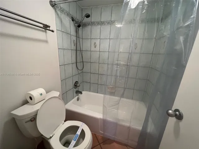a bathroom with a sink and toilet