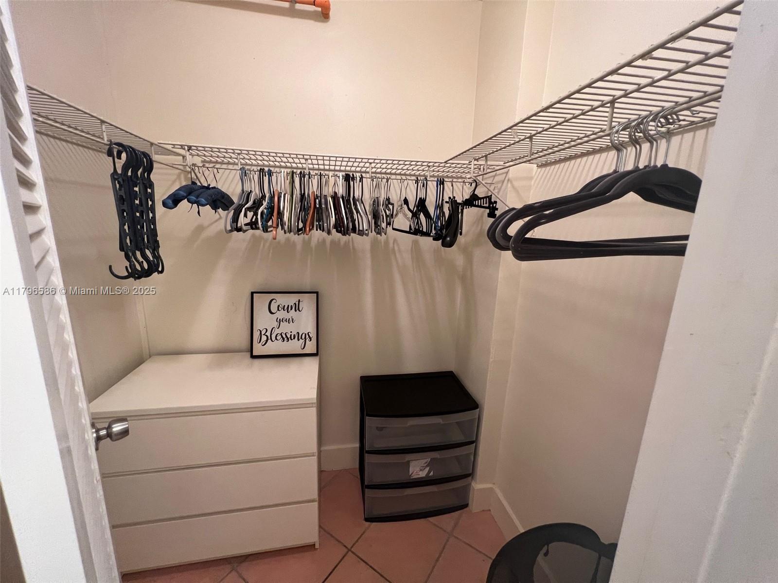 100 Lincoln Road, Unit 1209 Miami Beach, FL 33139 - Photo 19 of 52 a utility room with dryer and washer