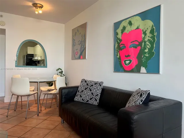 a living room with furniture and a couch