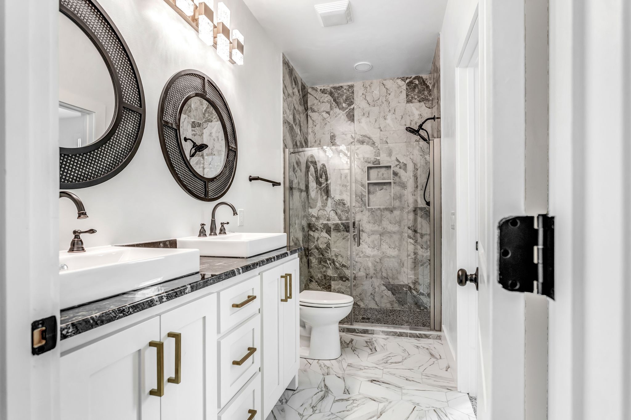 107 Shady Street Summertown, TN 38483 - Photo 20 of 31 a bathroom with a sink a toilet and a shower