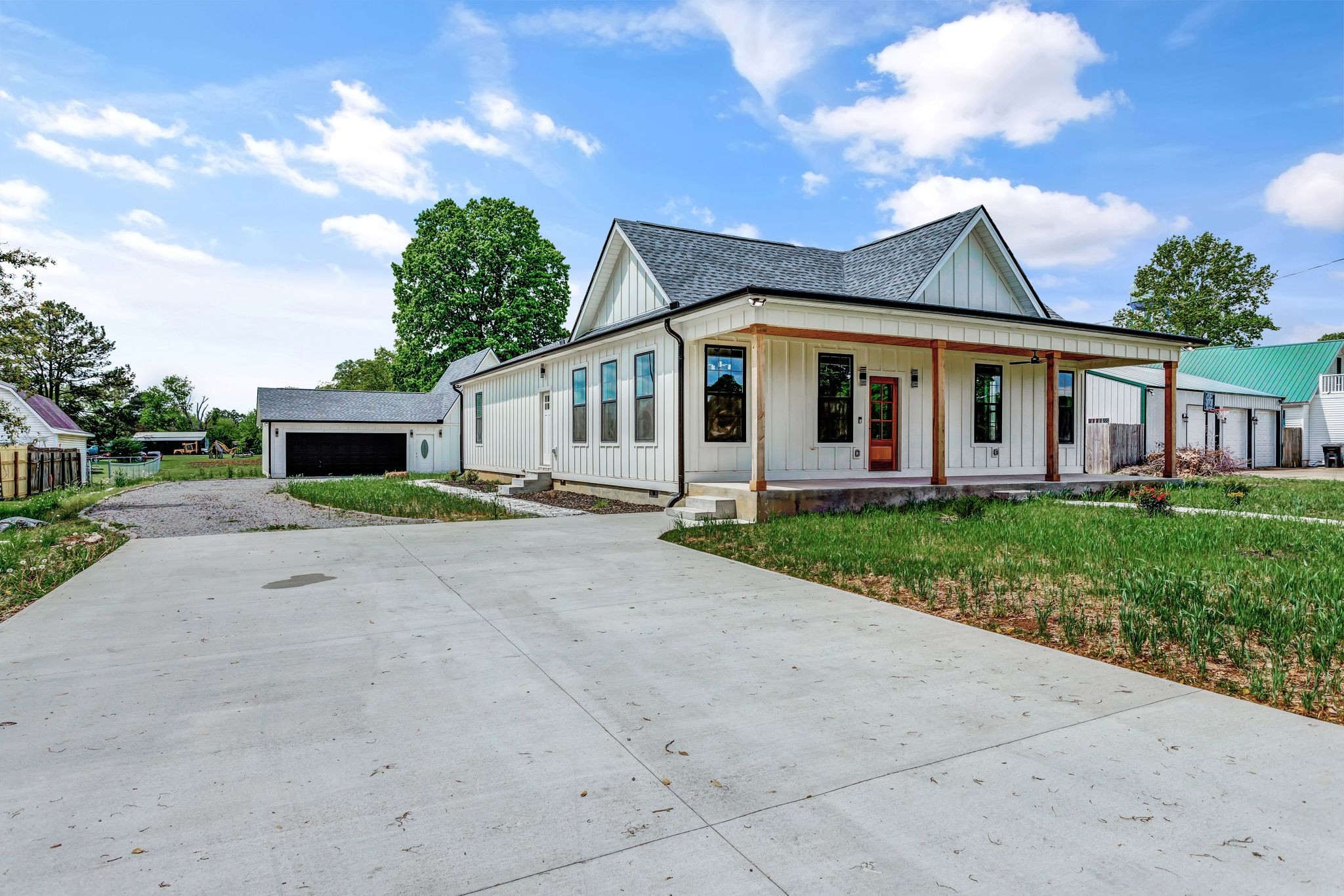 107 Shady Street Summertown, TN 38483 - Photo 2 of 31 a front view of a house with garden