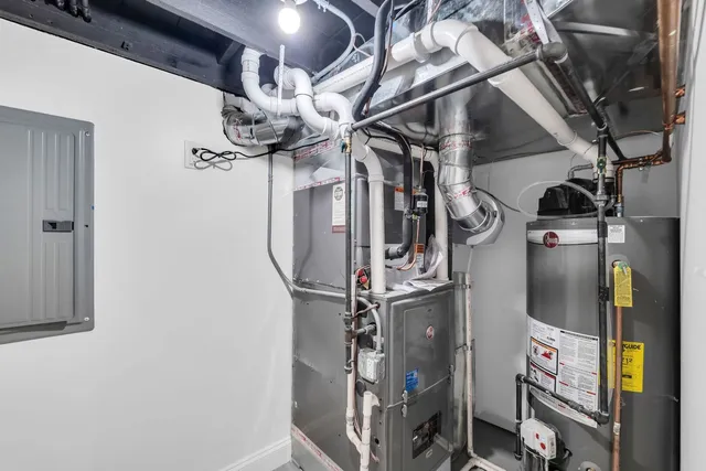 a view of storage and utility room with racks on the wall