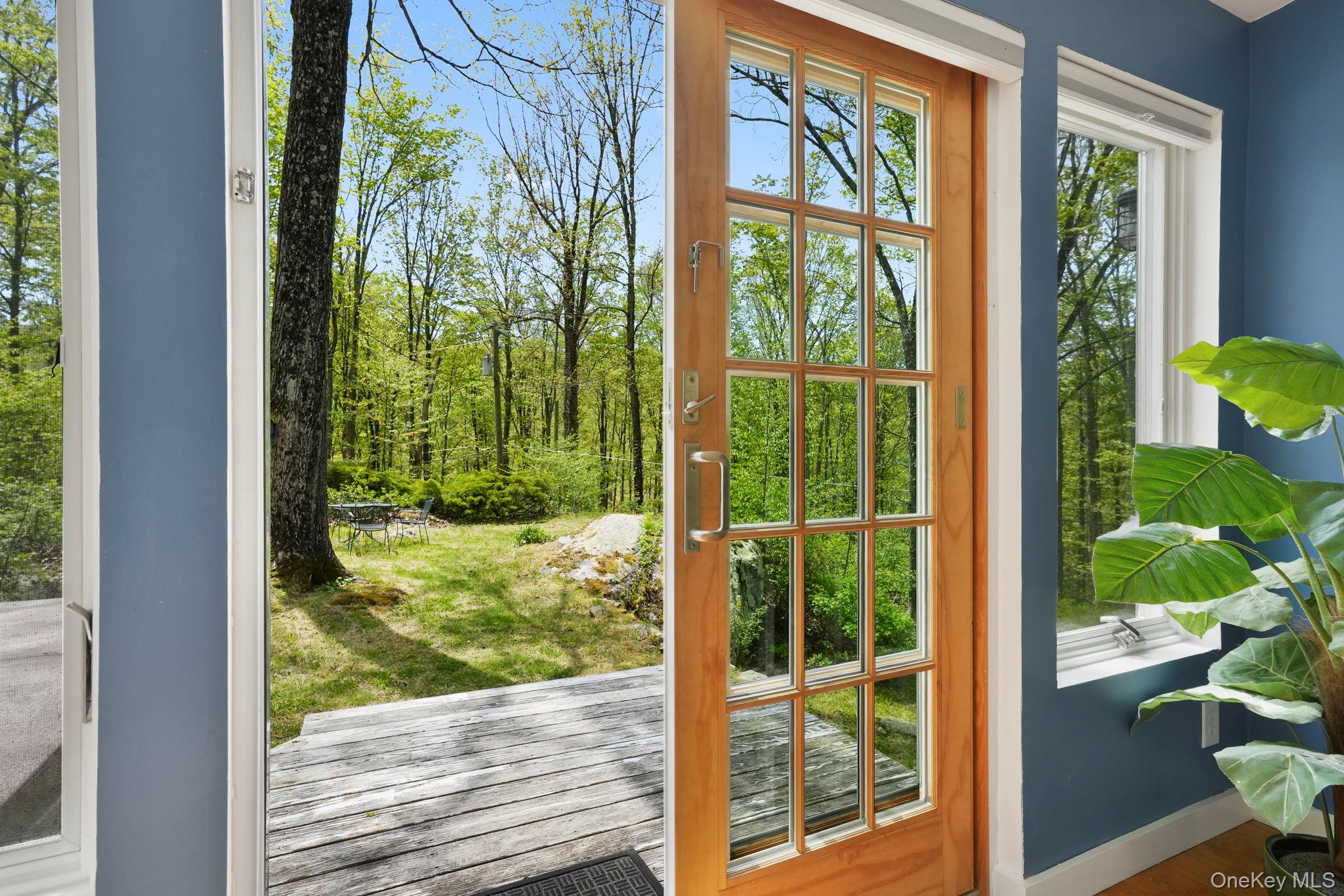 44 Tompkins Road Carmel, NY 10512 - Photo 15 of 31 a view of a porch and backyard of the house