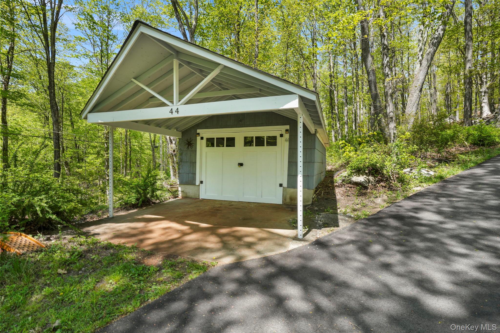 44 Tompkins Road Carmel, NY 10512 - Photo 26 of 31 a view of a house with backyard and garage