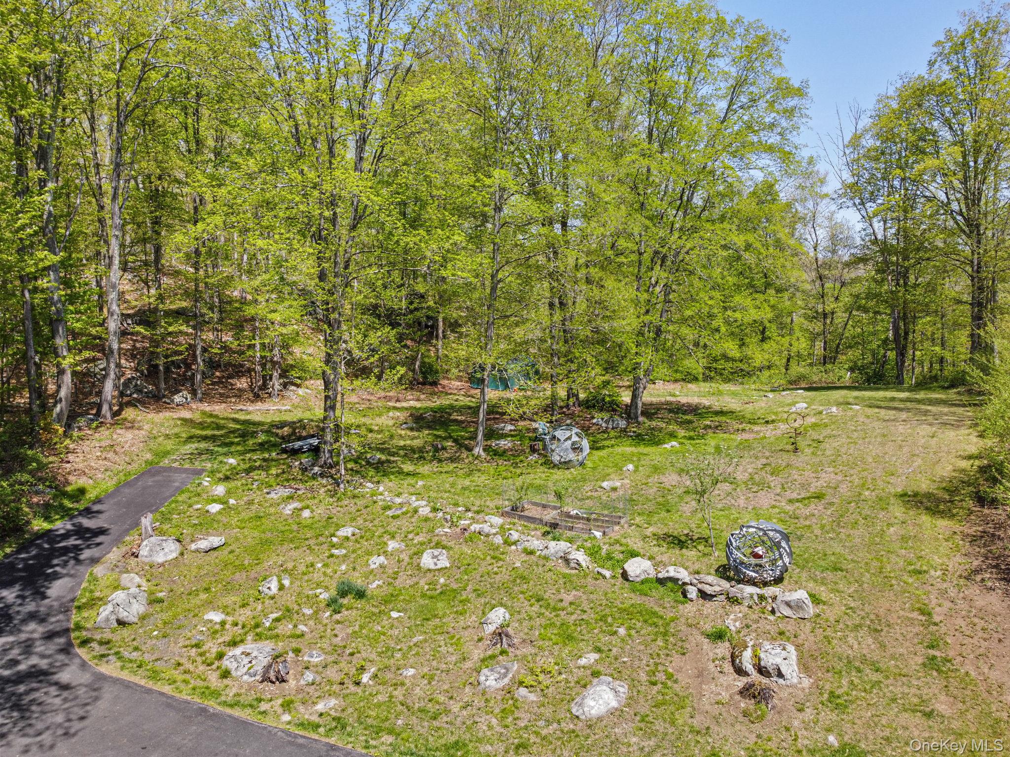 44 Tompkins Road Carmel, NY 10512 - Photo 29 of 31 a backyard of a house with lots of green space