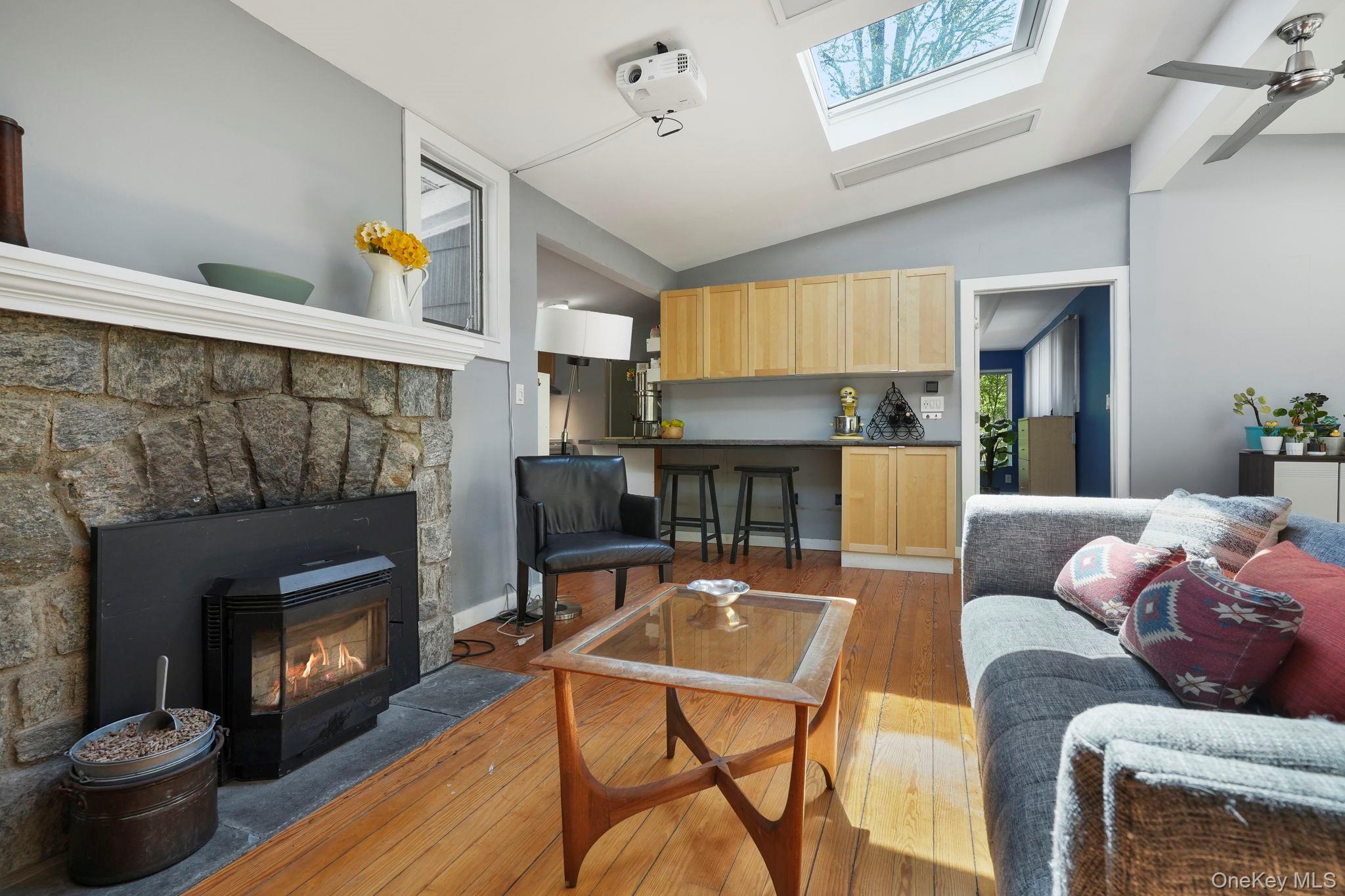 44 Tompkins Road Carmel, NY 10512 - Photo 10 of 31 a living room with furniture and a fireplace