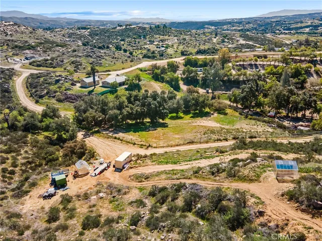 a view of a yard with a mountain