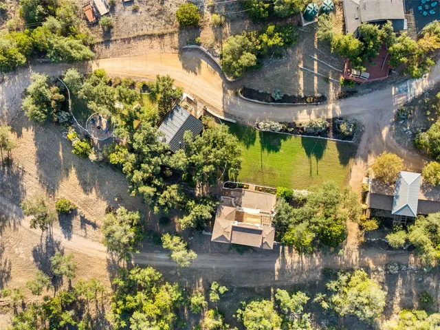 a view of a lake with a tree