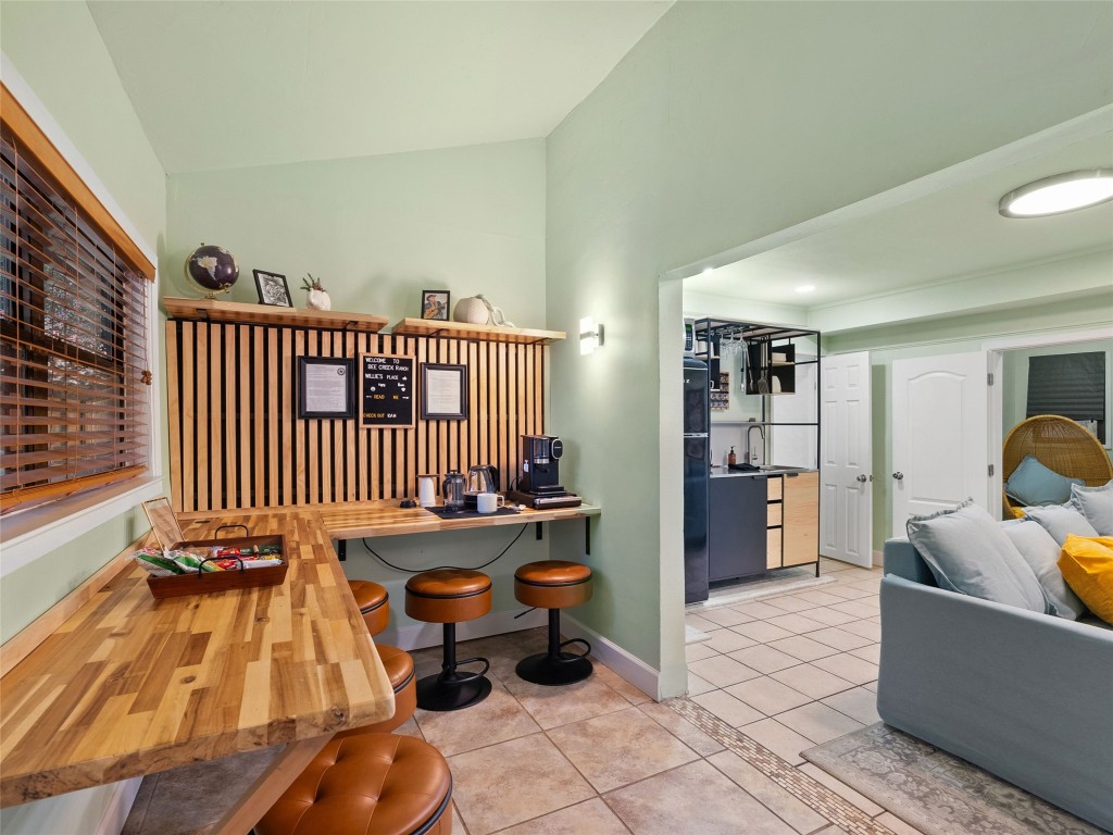 3500 R O Drive Spicewood, TX 78669 - Photo 18 of 40 a room with furniture and wooden floor