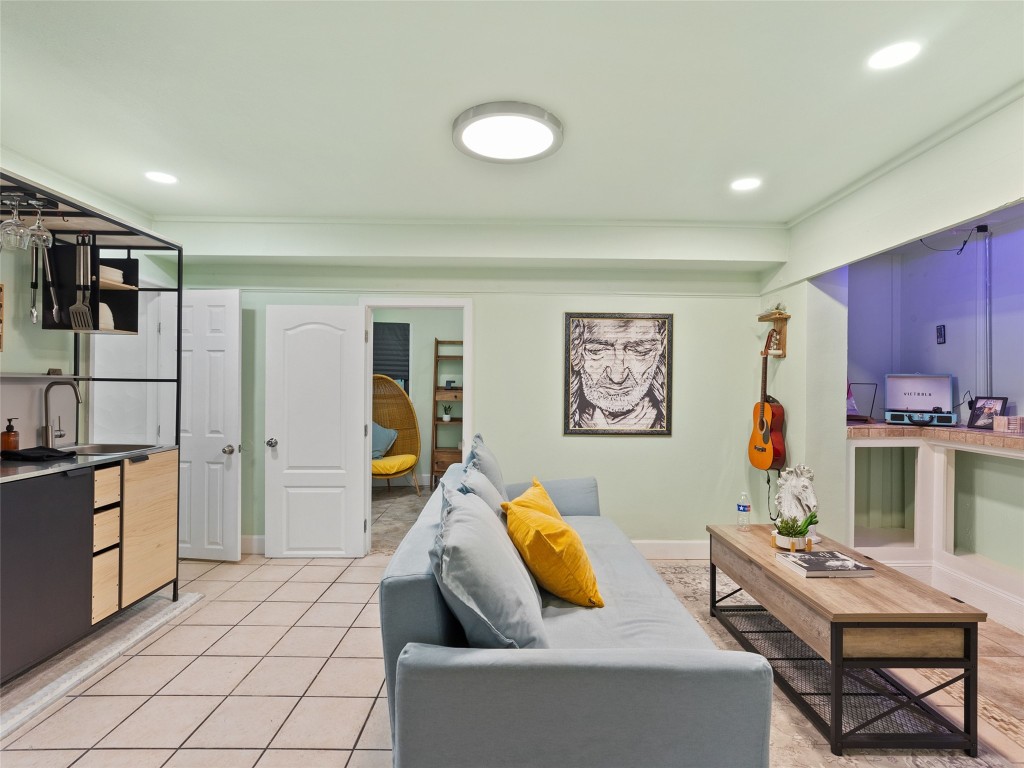 3500 R O Drive Spicewood, TX 78669 - Photo 19 of 40 a living room with furniture and kitchen view