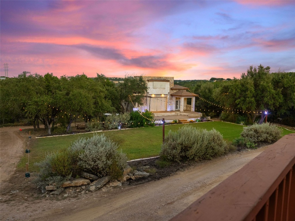 3500 R O Drive Spicewood, TX 78669 - Photo 23 of 40 a view of a garden with a house in the background