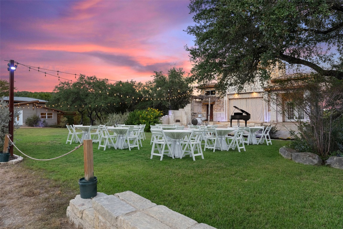 3500 R O Drive Spicewood, TX 78669 - Photo 24 of 40 a view of a house with backyard and a tree