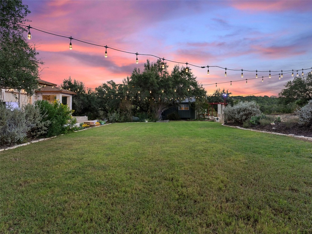 3500 R O Drive Spicewood, TX 78669 - Photo 26 of 40 a view of a big yard with a house in the background