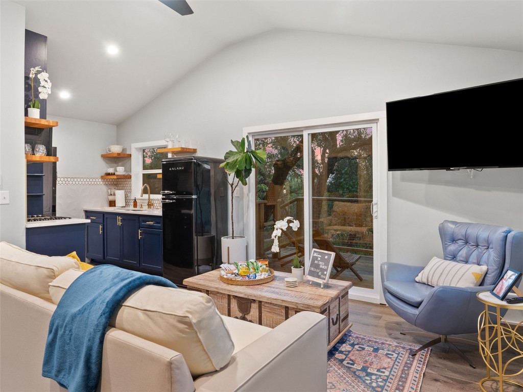 3500 R O Drive Spicewood, TX 78669 - Photo 31 of 40 a living room with furniture and a flat screen tv