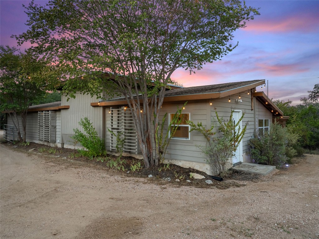 3500 R O Drive Spicewood, TX 78669 - Photo 37 of 40 a front view of a house with garden