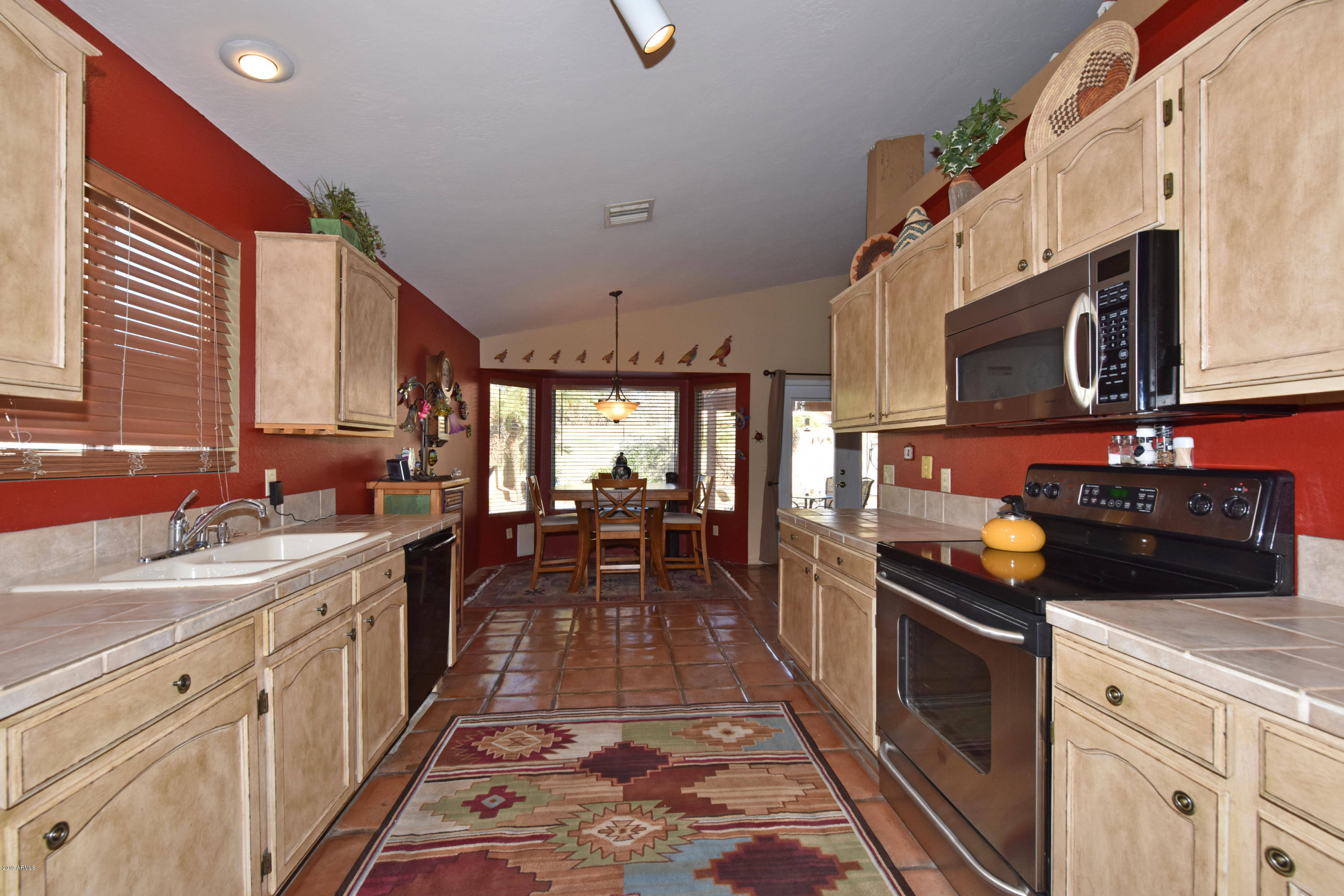 3532 East Utopia Road Phoenix, AZ 85050 - Photo 23 of 41 Kitchen Views to Dining