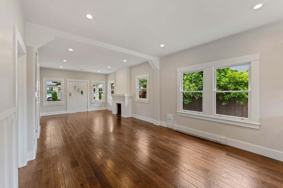 1309 Castillo Street Santa Barbara, CA 93101 - Photo 18 of 41 a view of an empty room with wooden floor and a window