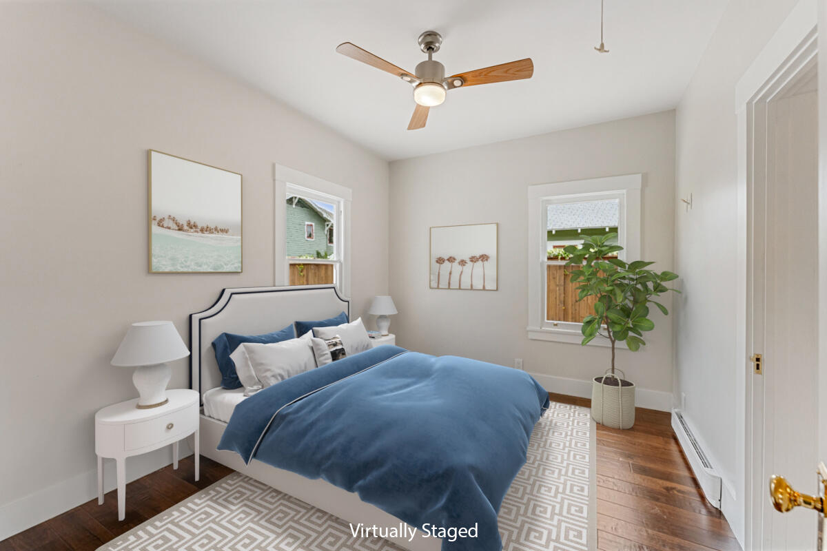 1309 Castillo Street Santa Barbara, CA 93101 - Photo 28 of 41 a bedroom with a bed and a potted plant